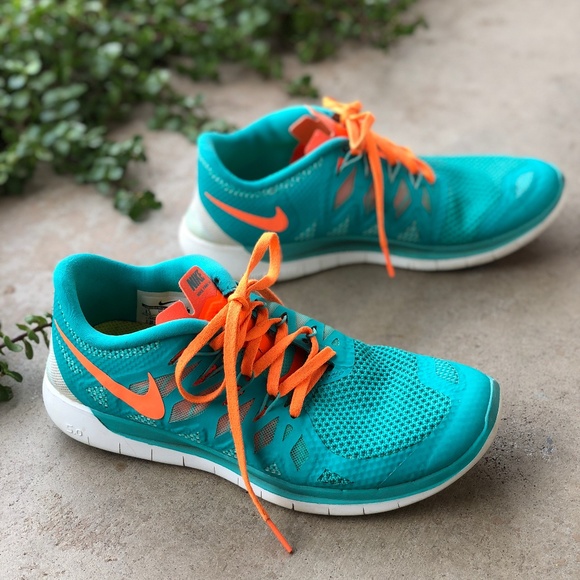 aqua and orange sneakers
